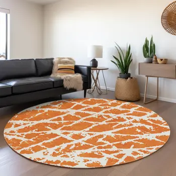 8' Orange And Ivory Abstract Washable Round Rug With UV Protection