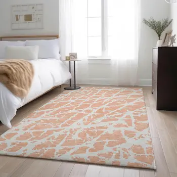 10' X 14' Peach And Ivory Abstract Washable Area Rug With UV Protection