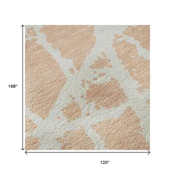 10' X 14' Peach And Ivory Abstract Washable Area Rug With UV Protection