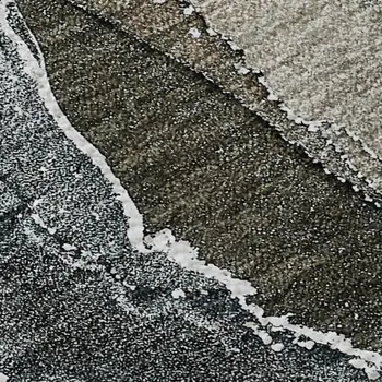 9' X 12' Orange And Charcoal Abstract Washable Area Rug With UV Protection