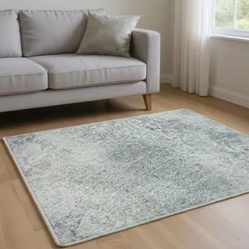 10' X 14' Ivory And Purple Abstract Washable Area Rug With UV Protection