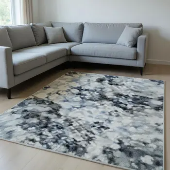 9' X 12' Navy Blue And Ivory Abstract Washable Area Rug With UV Protection