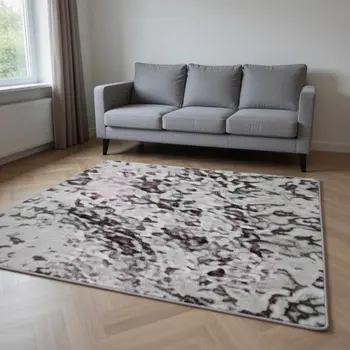 8' X 10' Pink And Ivory Abstract Washable Area Rug With UV Protection
