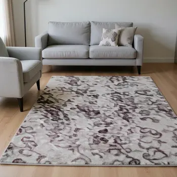 10' X 14' Pink And Ivory Abstract Washable Area Rug With UV Protection