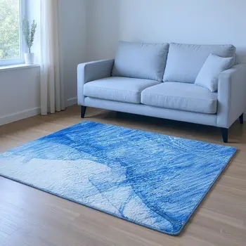 5' X 8' Blue And Ivory Abstract Washable Area Rug With UV Protection