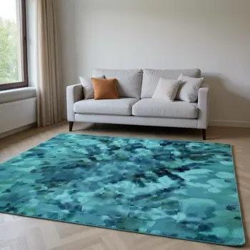 8' X 10' Teal And Ivory Abstract Washable Area Rug With UV Protection