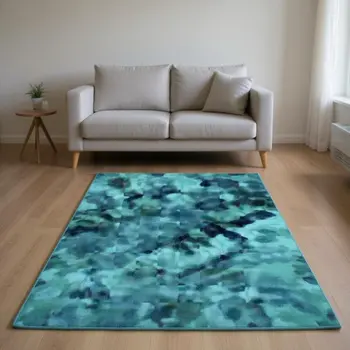10' X 14' Teal And Ivory Abstract Washable Area Rug With UV Protection