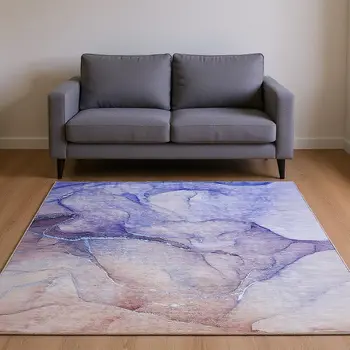 5' X 8' Navy Blue And Ivory Abstract Washable Area Rug With UV Protection