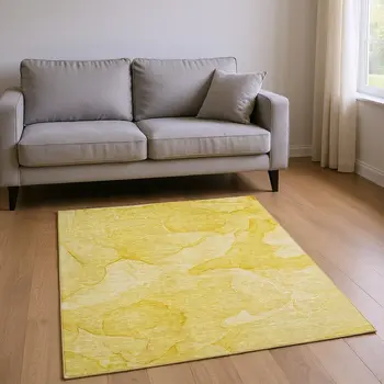 8' X 10' Gold And Ivory Abstract Washable Area Rug With UV Protection