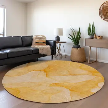 8' Orange And Ivory Abstract Washable Round Rug With UV Protection