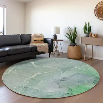 8' Teal And Ivory Abstract Washable Round Rug With UV Protection