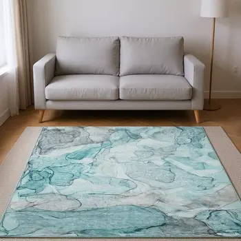 5' X 8' Teal And Ivory Abstract Washable Area Rug With UV Protection