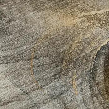 8' Brown And Ivory Abstract Washable Round Rug With UV Protection