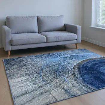 8' X 10' Navy Blue And Ivory Abstract Washable Area Rug With UV Protection