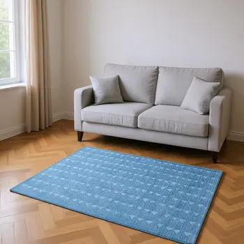 5' X 8' Blue And Ivory Geometric Washable Area Rug With UV Protection