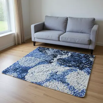 5' X 8' Navy Blue And Ivory Abstract Washable Area Rug With UV Protection