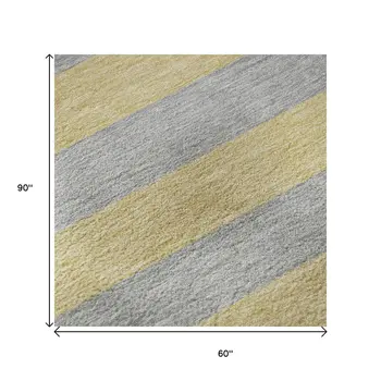 5' X 8' Silver And Gold Striped Washable Area Rug With UV Protection
