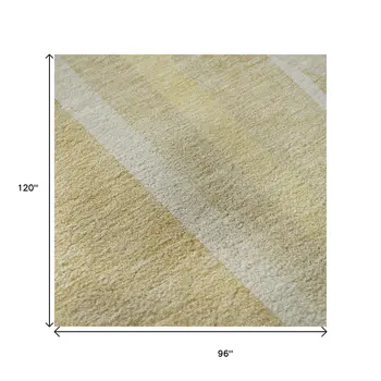 8' X 10' Beige And Gold Geometric Washable Area Rug With UV Protection