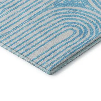 3' X 5' Teal And Ivory Geometric Washable Area Rug With UV Protection