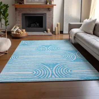 3' X 5' Teal And Ivory Geometric Washable Area Rug With UV Protection