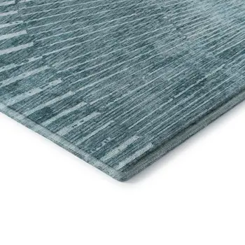 5' X 8' Teal And Ivory Geometric Washable Area Rug With UV Protection