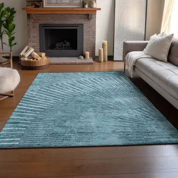 5' X 8' Teal And Ivory Geometric Washable Area Rug With UV Protection