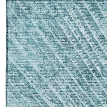 9' X 12' Teal And Ivory Geometric Washable Area Rug With UV Protection