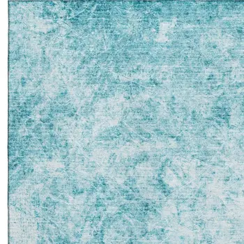 5' X 8' Teal And Ivory Abstract Washable Area Rug With UV Protection