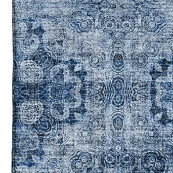 5' X 8' Navy Blue And Ivory Floral Medallion Washable Area Rug With UV Protection