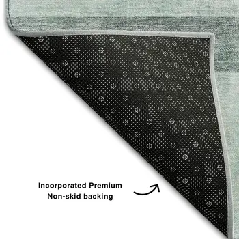 5' X 8' Teal And Ivory Abstract Washable Area Rug With UV Protection