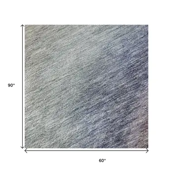 5' X 8' Beige Purple And Blue Ombre Washable Area Rug With UV Protection