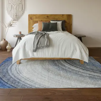 5' X 8' Blue Ivory And Gray Ombre Washable Area Rug With UV Protection