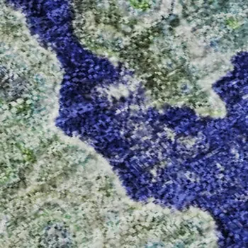 9' X 12' Green Blue And Ivory Abstract Washable Area Rug With UV Protection