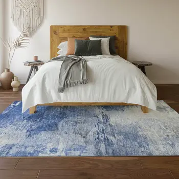 5' X 8' Blue And Ivory Abstract Washable Area Rug With UV Protection