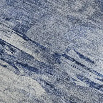 5' X 8' Blue And Ivory Abstract Washable Area Rug With UV Protection