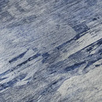 9' X 12' Blue And Ivory Abstract Washable Area Rug With UV Protection