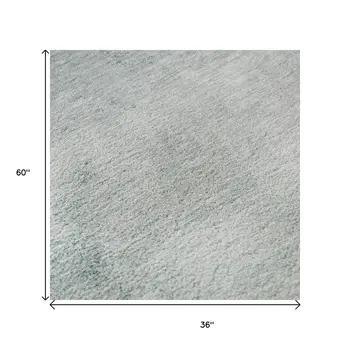 3' X 5' Teal And Ivory Abstract Washable Area Rug With UV Protection