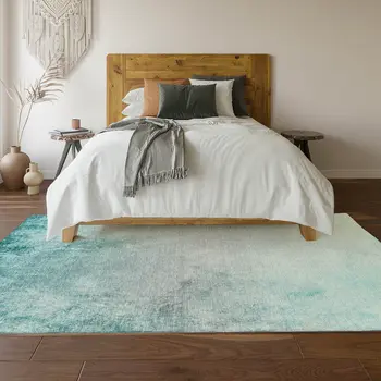 8' X 10' Teal And Ivory Abstract Washable Area Rug With UV Protection