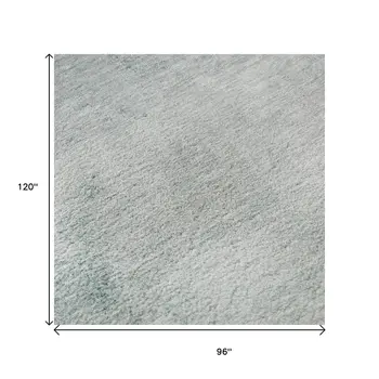 8' X 10' Teal And Ivory Abstract Washable Area Rug With UV Protection