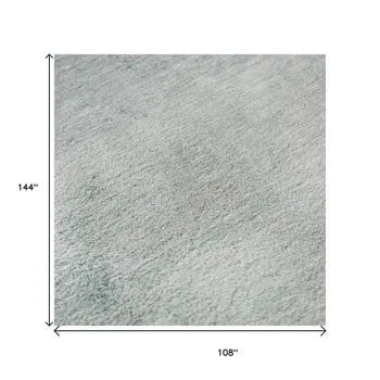9' X 12' Teal And Ivory Abstract Washable Area Rug With UV Protection