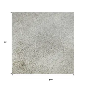 5' X 8' Taupe And Ivory Abstract Washable Area Rug With UV Protection