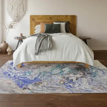 8' X 10' Beige Blue And Ivory Abstract Washable Area Rug With UV Protection