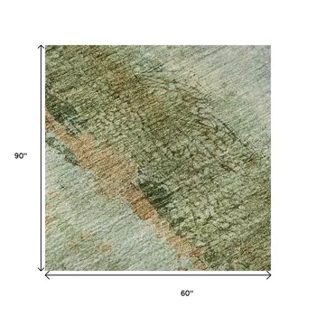 5' X 8' Green Blue And Gold Abstract Washable Area Rug With UV Protection