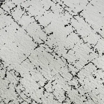 8' X 10' Black And Ivory Abstract Washable Area Rug With UV Protection