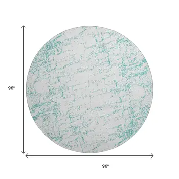 8' Teal And Ivory Abstract Washable Round Rug With UV Protection