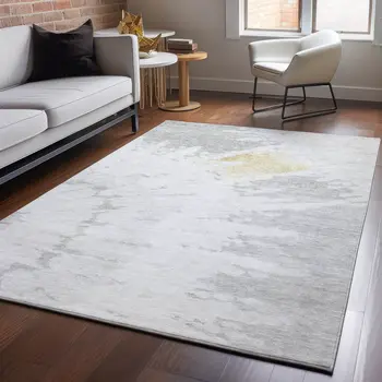 5' X 8' Silver Gold And Ivory Abstract Washable Area Rug With UV Protection