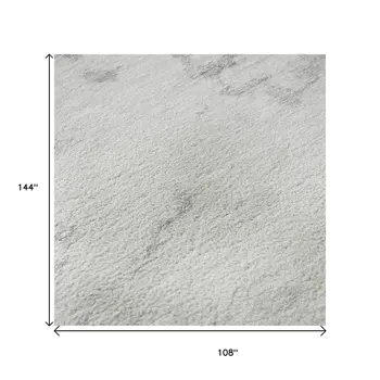 9' X 12' Silver Gold And Ivory Abstract Washable Area Rug With UV Protection