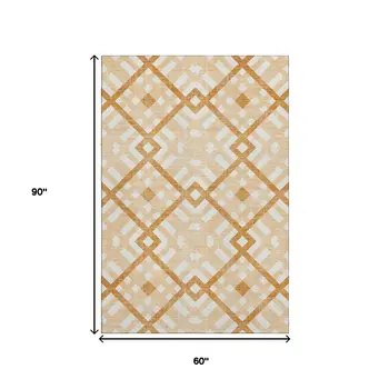 5' X 8' Peach And Ivory Geometric Washable Area Rug With UV Protection