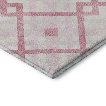 5' X 8' Pink And Ivory Geometric Washable Area Rug With UV Protection