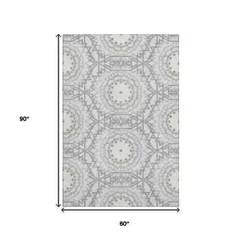 5' X 8' Silver And Gray Geometric Washable Area Rug With UV Protection
